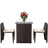 A three-piece outdoor patio set with two comfortable chairs and a matching table for enjoying the outdoors.